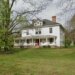 two story house with large yard