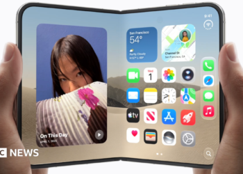 An image of the new foldable iPhone Duo in a woman's hands, being opened like a book.