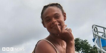 Tasia Fortune, 29, poses for a photo during a family reunion in Kentucky