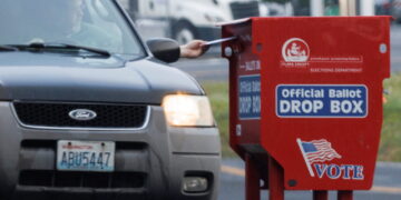 A freshly replaced ballot box replaces one that had been charred by arson in Vancouver, Washington