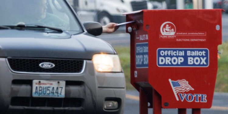 A freshly replaced ballot box replaces one that had been charred by arson in Vancouver, Washington