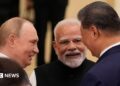 Chinese President Xi Jinping and India Prime Minister Narendra Modi meet on the sidelines of the BRICS summit in Kazan, Russia October 23, 2024.