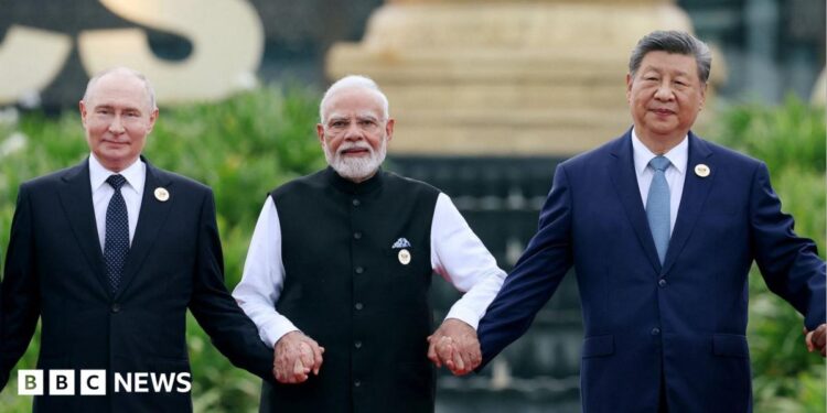 Russia's President Vladimir Putin, India's Prime Minister Narendra Modi and China's President Xi Jinping pose for a family photo during the BRICS summit in New Delhi, India, September 12, 2026