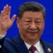 Chinese President Xi Jinping waves as he arrives at the opening ceremony for the World AI Conference on July 17, 2026 in Shanghai, China.
