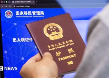 A person holding a Chinese passport
