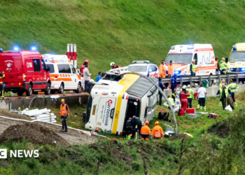 Emergency responders at the scene of an accident involving a travel coach in Susch in the canton of Grisons, Switzerland, 10 September 2026.