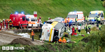 Emergency responders at the scene of an accident involving a travel coach in Susch in the canton of Grisons, Switzerland, 10 September 2026.
