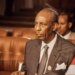 Mohammed Siad Barre stands for a portrait photograph.