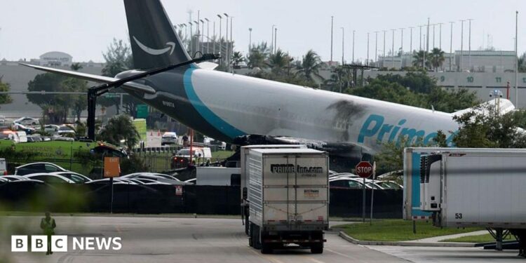 The plane sitting at a crooked angle to the ground