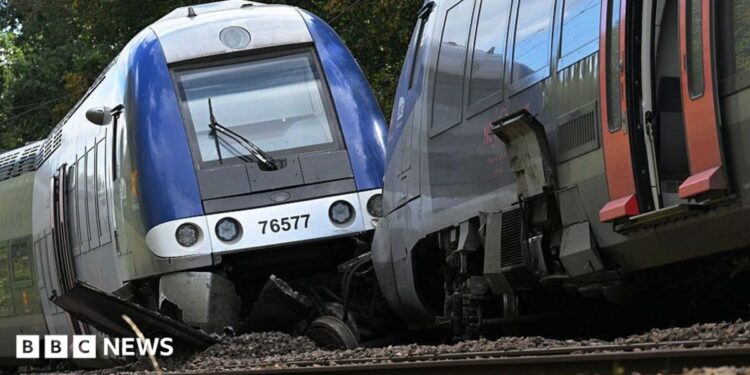 A derailed carriage of a passenger train in Cléon, northern France. Photo: 12 September 2026.