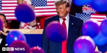 Donald Trump on stage as balloons fall at Republican Convention