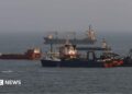 File photo showing commercial ships anchored in the Strait of Hormuz, off the coast of Bandar Abbas, Iran (10 August 2026)