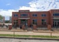 A dispute involving individuals associated with a Jimmy John's restaurant in St. Louis ended with a 14-year-old girl being shot in the leg, leading to the arrest of two men, authorities said.