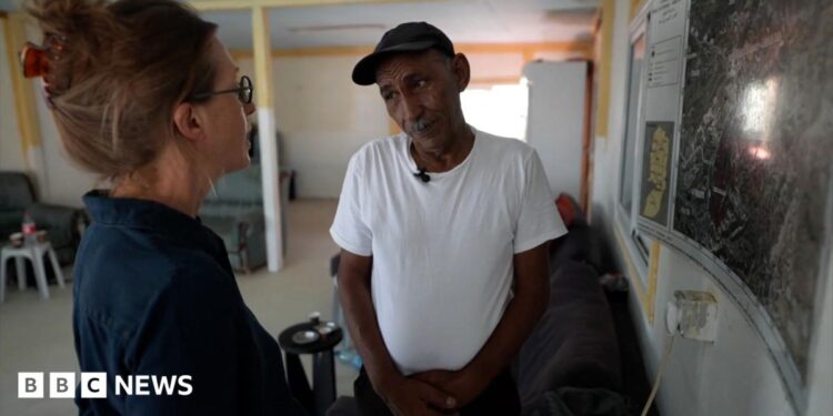 engrab or report showing Lucy Williamson speaking to Bedouin community leader Eid Khamis