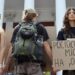 Activists holding placards take part in a rally in support of introducing a moratorium on the public use of Russian-language cultural products on July 8, 2026 in Odesa, Ukraine