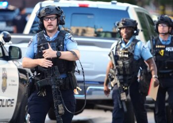 Police respond to a shooting in downtown Minneapolis.