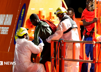 Migrants disembark vessel in Arguineguín, Gran Canaria, Spain, on 3 September