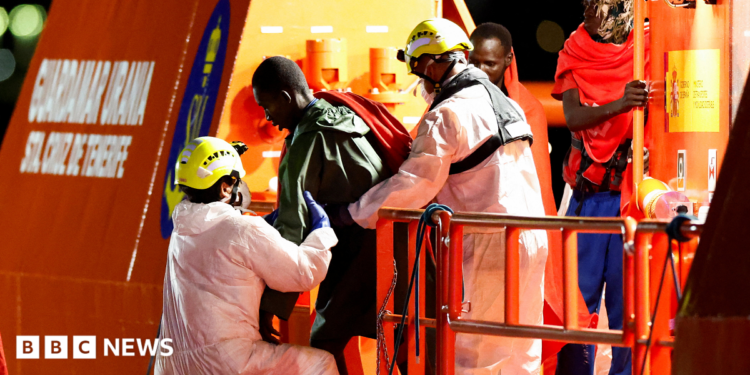 Migrants disembark vessel in Arguineguín, Gran Canaria, Spain, on 3 September