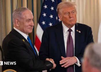 Trump and Netanyahu shaking hands in July at the White House
