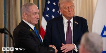 Trump and Netanyahu shaking hands in July at the White House