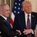 Trump and Netanyahu shaking hands in July at the White House