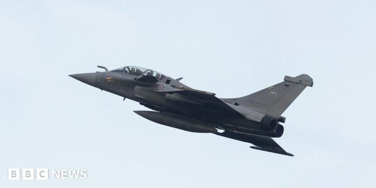 A Rafale B standard F4 fighter jet of France's air force flies as part of Nato's Enhanced Air Policing (eAP) mission in the Baltic States, on December 17, 2024 at Siauliai airbase in Lithuania.