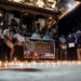 People observe a moment of silence as they gather at the Basantapur Durbar Square to mark a national mourning day in Kathm...