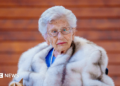 Princess Astrid is shown with white hair and wearing a thick coat aged 93 in May 2025