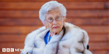 Princess Astrid is shown with white hair and wearing a thick coat aged 93 in May 2025