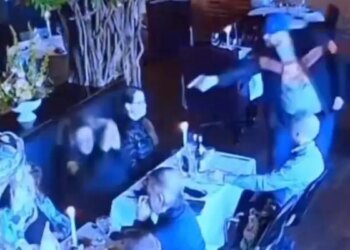 Matthew Exton points a gun at the head of his ex-wife