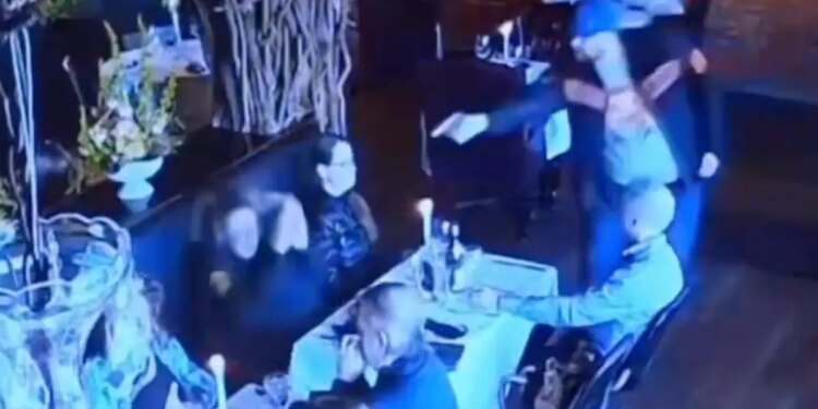 Matthew Exton points a gun at the head of his ex-wife