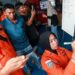 Relatives of affected passengers look on as a National Search and Rescue Agency (Basarnas) officer writes updates on a whiteboard amid ongoing rescue operations on the stricken Virgo Transport 8 ferry, at Trisakti Bandarmasih Port in Banjarmasin, South Kalimantan, on September 13, 2026.
