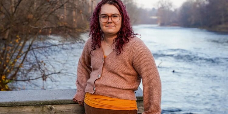 Prisha Mosley, who transitioned to male and began taking testosterone when she was a minor, poses for a photo in Michigan, U.S., November 3, 2022. Mosley now regrets the medical treatment.
