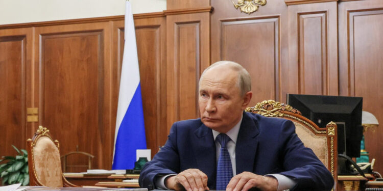 Russian President Putin attends a meeting with head of Tver region Korolyov in Moscow