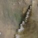 A satellite image shows smoke rising from the Saudi Aramco bulk plant in Abha, Saudi Arabia, after what the Saudi-led coalition in Yemen said were missile and drone attacks by Yemen's Iran-backed Houthi movement (8 September 2026)