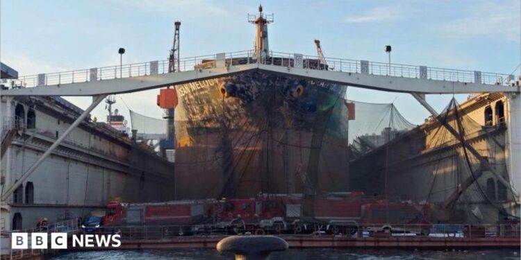 Large boat undergoing maintenance