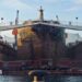 Large boat undergoing maintenance