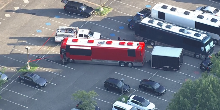 An overhead view of the tour bus that collapsed onto a worker