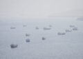 FILE PHOTO: Vessels near the Strait of Hormuz, as seen from Musandam