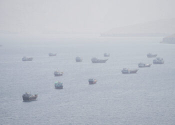 FILE PHOTO: Vessels near the Strait of Hormuz, as seen from Musandam