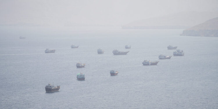 FILE PHOTO: Vessels near the Strait of Hormuz, as seen from Musandam