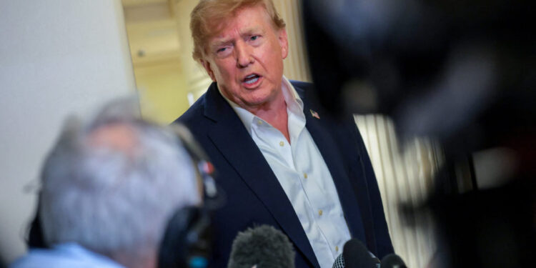 U.S. President Donald Trump speaks to members of the media after traveling to Ireland