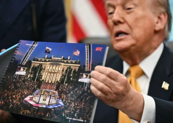 US President Donald Trump's birthday bash comes back to bite as his team begs for money to cover expenses. (Photo by Kent NISHIMURA / AFP via Getty Images)