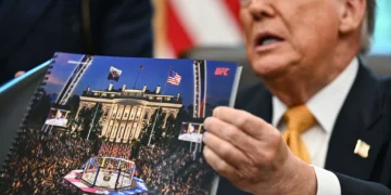 US President Donald Trump's birthday bash comes back to bite as his team begs for money to cover expenses. (Photo by Kent NISHIMURA / AFP via Getty Images)