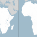 Side-by-side maps of Africa comparing two map projections. The Mercator projection on the left makes Africa appear smaller in comparison with Europe to its north. The Equal Earth projection on the right shows a longer, more proportionally accurate shape of the continent.