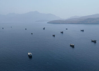 FILE PHOTO: A drone view shows vessels near the Strait of Hormuz, as seen from Musandam