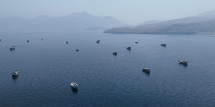 FILE PHOTO: A drone view shows vessels near the Strait of Hormuz, as seen from Musandam
