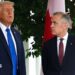US President Donald Trump speaks to Canadian Prime Minister Mark Carney  during a welcome outside the West Wing of the White House in October 2025