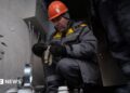 Workers from the Ukrainian energy company DTEK perform repairs at an electrical substation in Kyiv, Ukraine, 21 January 2026, amid the Russian invasion.