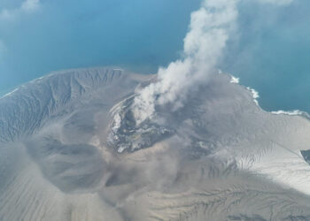 A drone view shows Mount Anak Krakatau volcano spewing hot ash during an eruption in South Lampung